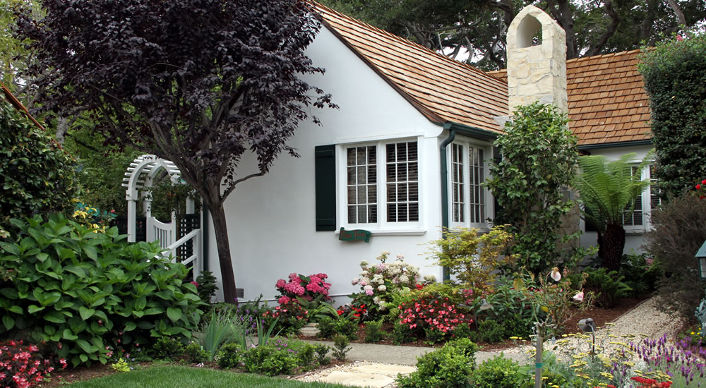 friar tuck cottage in lush gardens
