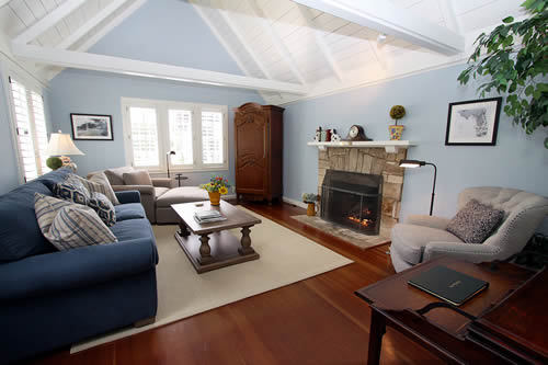 carmel cottages in english gardens - living room with fireplace